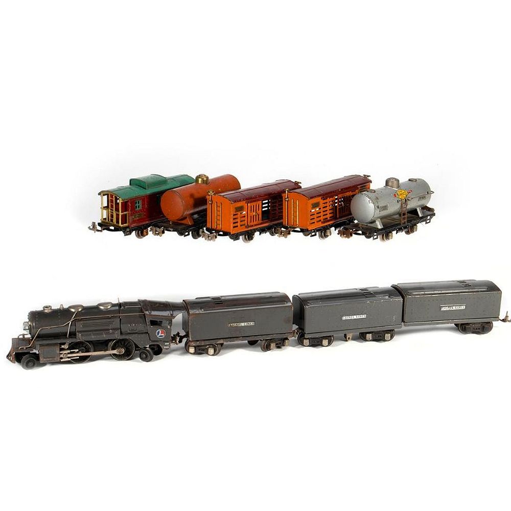 Appraisal: Lionel train cars Lionel E Locomotive with whistling tender Extra