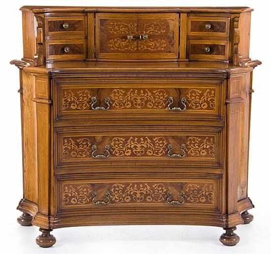 Appraisal: Continental marquetry inlaid walnut tiered bureau th century serpentine tier