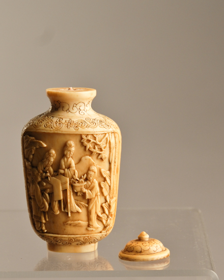 Appraisal: A th C Carved Ivory Snuff Bottle in a shouldered