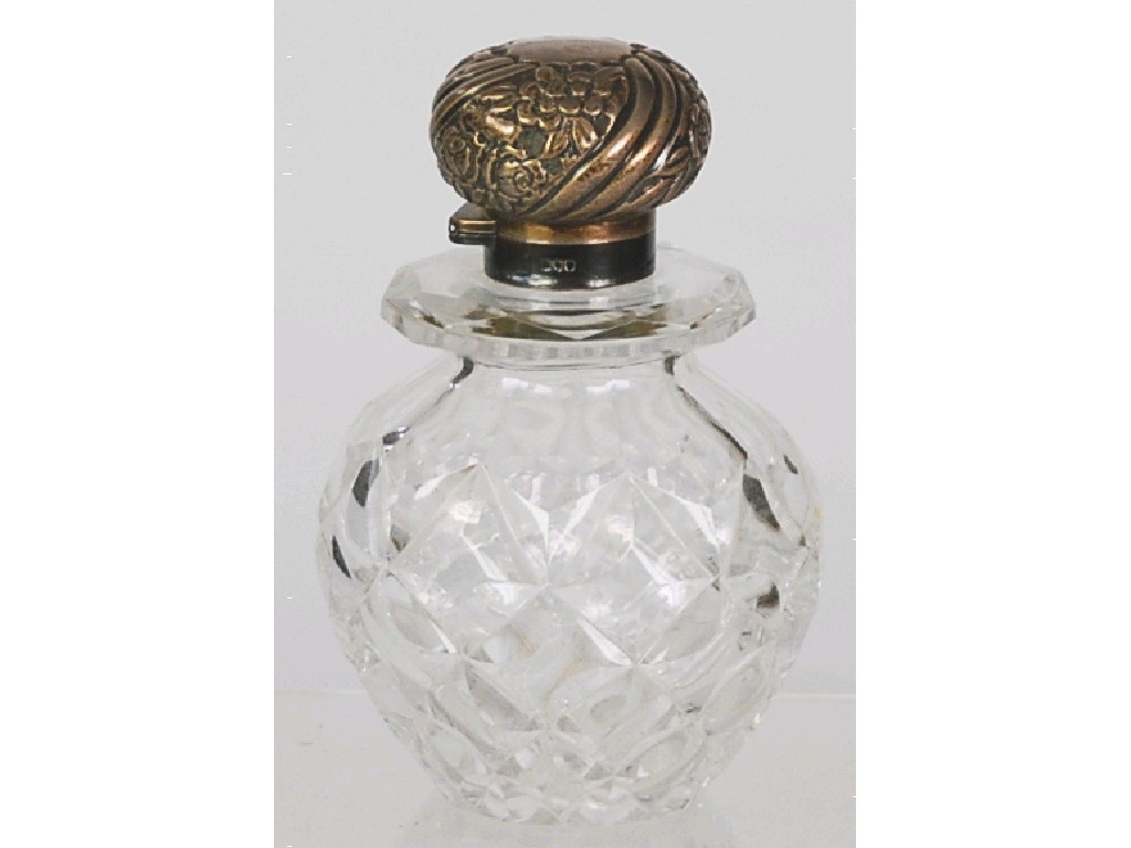 Appraisal: VICTORIAN CUT GLASS SCENT BOTTLE with silver lid orbicular with