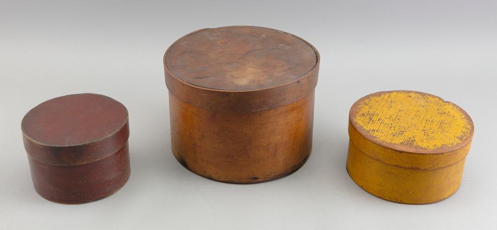 Appraisal: THREE ROUND WOODEN BOXES TH CENTURY HEIGHTS FROM TO DIAMETERS