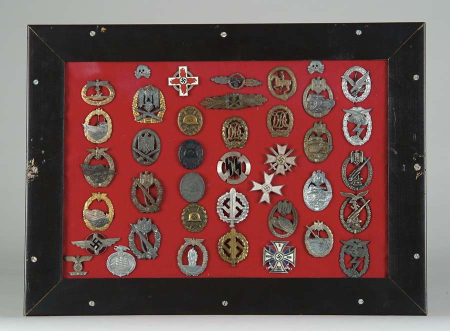 Appraisal: TWO FRAMES OF NAZI BADGES MEDALS ETC Contains three service