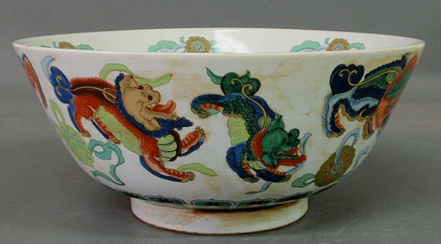 Appraisal: Oriental porcelain punchbowl th c with dragon decoration h x