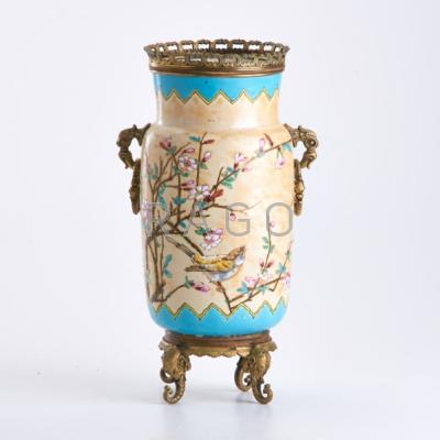 Appraisal: STYLE OF LONGWY Glazed earthenware vase with bronze mounts th