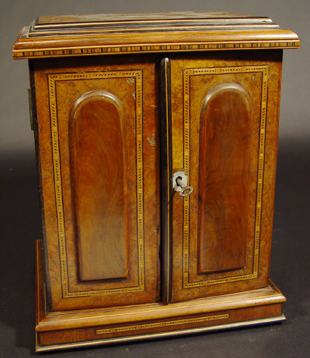 Appraisal: Victorian inlaid burr walnut jewellery cabinet the pair of panelled