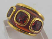 Appraisal: ADLER an carat yellow gold and red stone dress ring