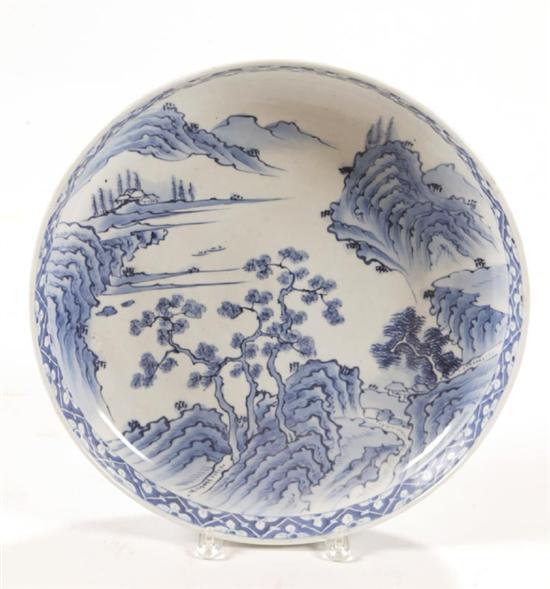 Appraisal: CHARGER Asian th century porcelain Hand brushed blue on white