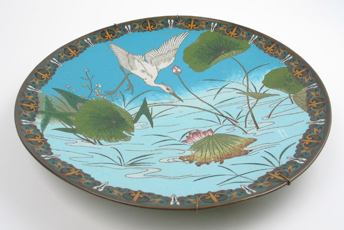 Appraisal: A JAPANESE MEIJI PERIOD CLOISONNE ENAMEL CHARGER The water scene