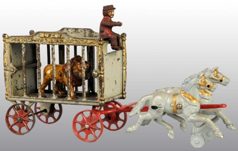 Appraisal: Cast Iron -Horse Royal Circus Cage Wagon Toy Description All