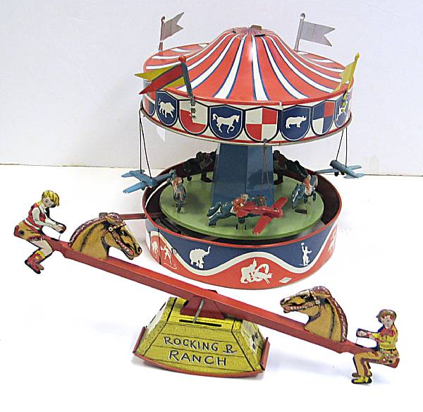 Appraisal: Children s Amusement Park toys Includes a colorful Wolverine Carousel