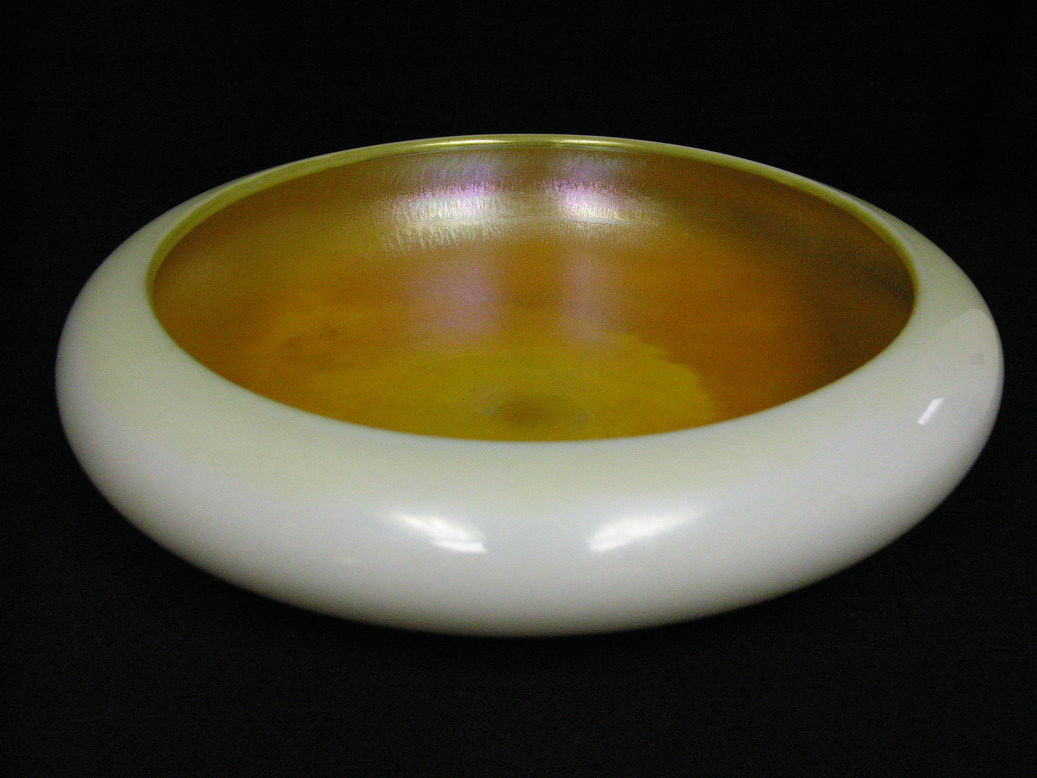 Appraisal: LARGE STEUBAN GOLD AURENE AND CALCITE BOWL gold aurene interior