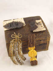 Appraisal: A gold embossed leather box containing Russian Tula steel pieces