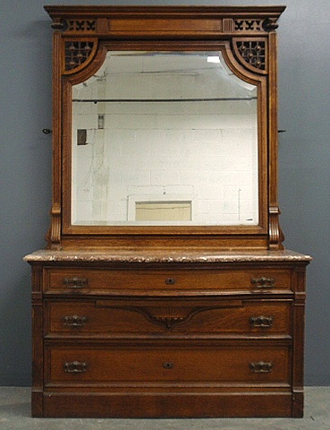 Appraisal: - Oak dresser c with beveled glass mirror serpentine front