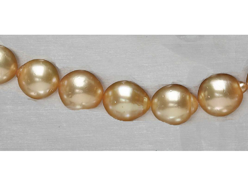 Appraisal: SOUTH SEA GOLDEN PEARL NECKLACE A cultured strand of twenty-nine