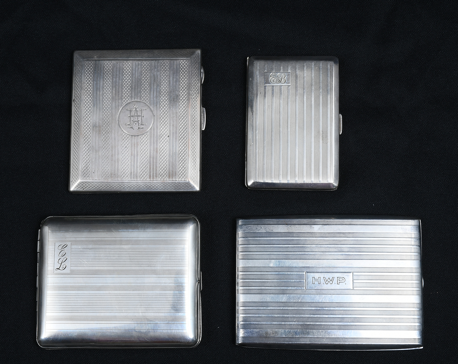 Appraisal: ART DECO STERLING SILVER CIGARETTE CASES Comprising - Napier case