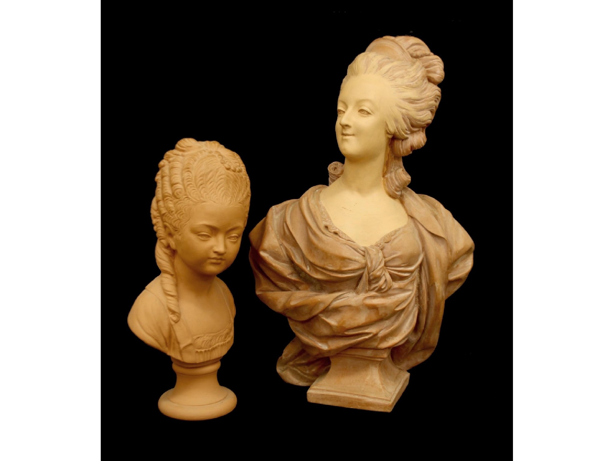 Appraisal: Two terracotta style busts of regal ladies and high respectively