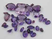 Appraisal: A quantity of loose polished amethysts approx carats