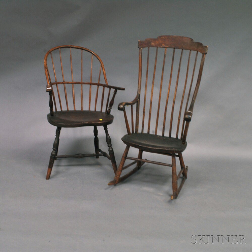 Appraisal: Two Windsor Chairs th century a sack-back armchair with splayed