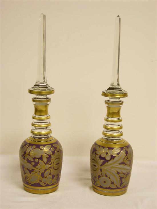 Appraisal: Pair of Continental blow glass decanters gilt floral decoration against