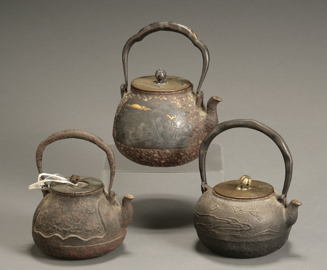 Appraisal: Three Japanese Cast-Iron Tea Pots Kame Edo Period th Century