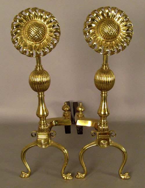 Appraisal: Brass sunflower andirons th c h together with three fireplace