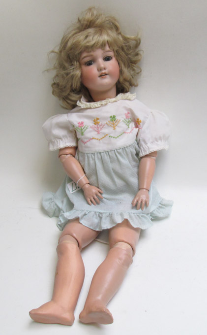 Appraisal: ARMAND MARSEILLE BISQUE SOCKET HEAD DOLL having blond wig blue