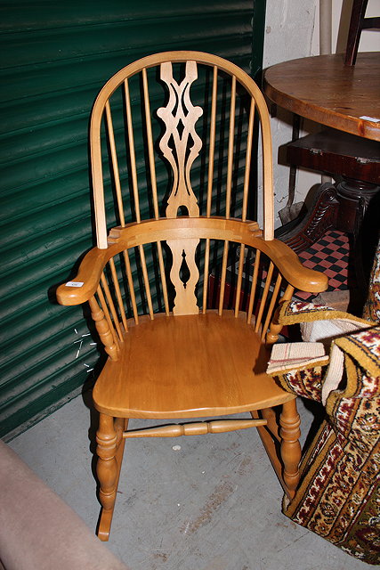 Appraisal: A MODERN BEECH WOOD SPINDLE BACK ROCKING CHAIR