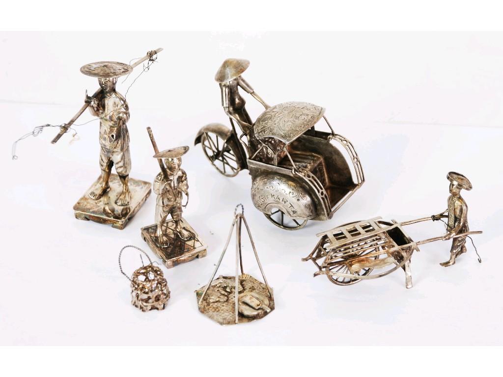 Appraisal: ORIENTAL SILVER COLOURED METAL MINIATURE MODEL OF A BICYCLE RICKSHAW