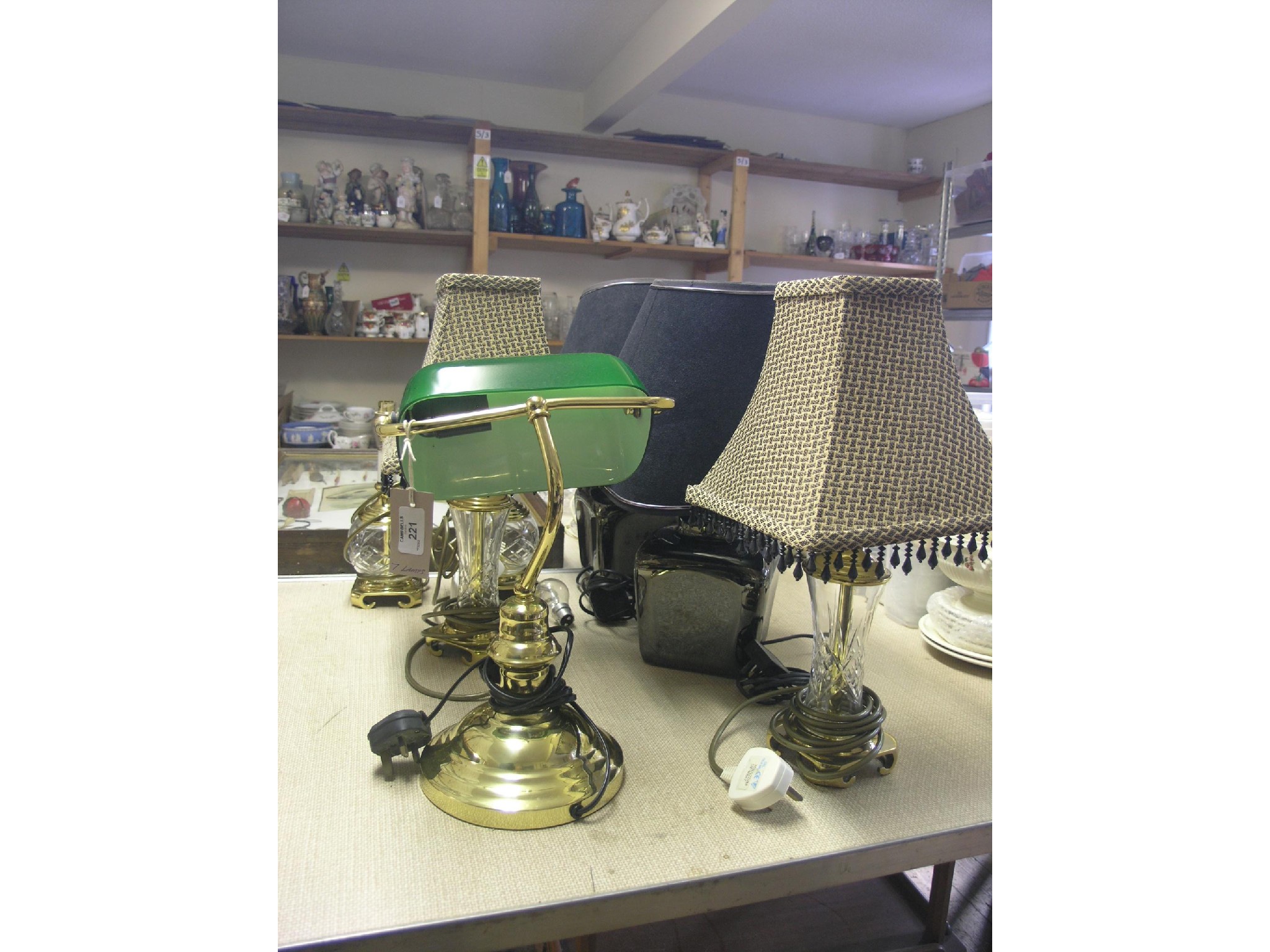 Appraisal: A brass desk lamp with green glass shade two pairs