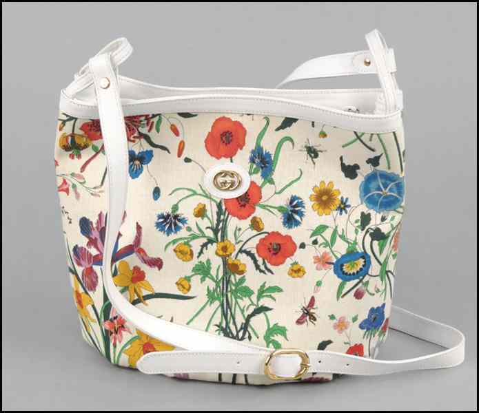 Appraisal: GUCCI FLORAL PRINT CANVAS AND LEATHER HANDBAG H '' W