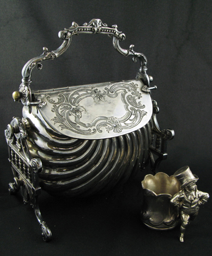 Appraisal: AN OLD SHEFFIELD SILVERPLATED TEA CADDY AND A BARBOUR FIGURAL