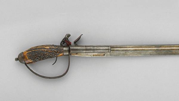 Appraisal: A continental combination hunting sword flintlock pistol The inch double