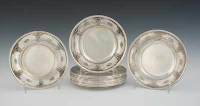 Appraisal: A Set of Twelve of Sterling Silver Bread Plates in