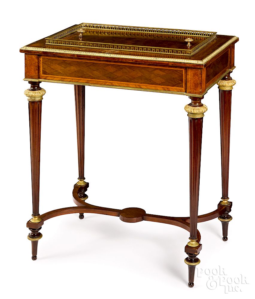 Appraisal: French marquetry and ormolu mounted wine table Exclusive on Bidsquare