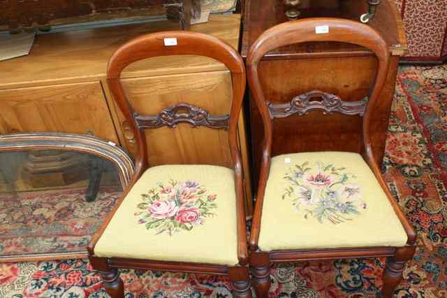 Appraisal: A PAIR OF VICTORIAN HOOP BACK DINING CHAIRS with horizontal