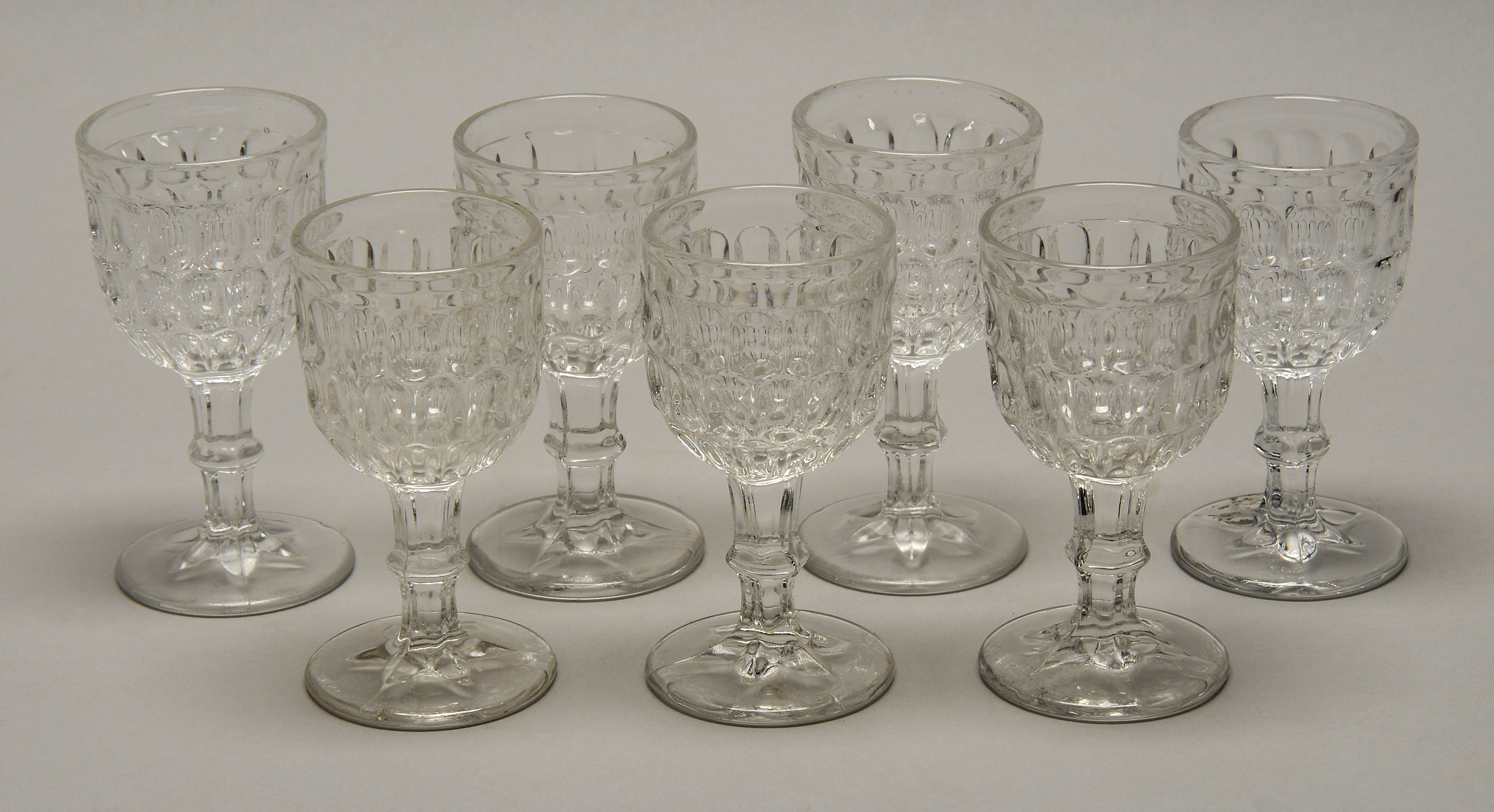 Appraisal: SIX AMERICAN PRESSED COLORLESS WINEGLASSES Possibly Pittsburgh Late th Early