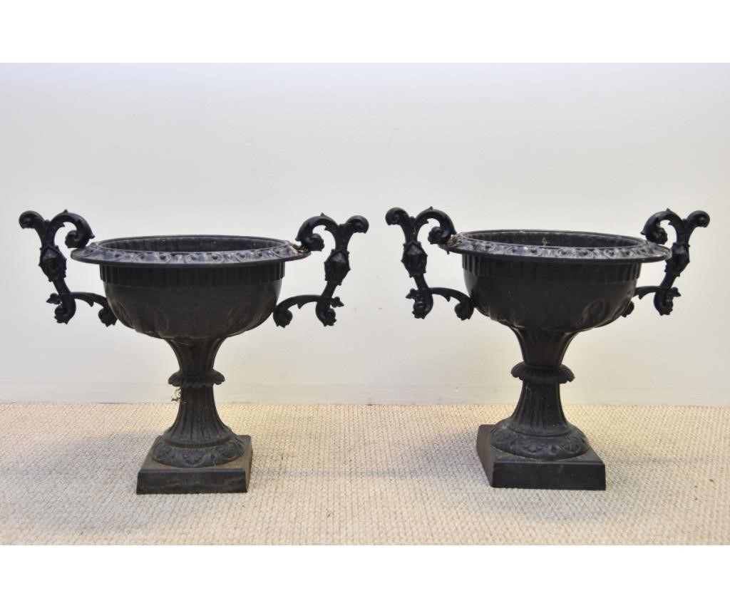 Appraisal: Pair of Victorian powder coated cast iron urns h x