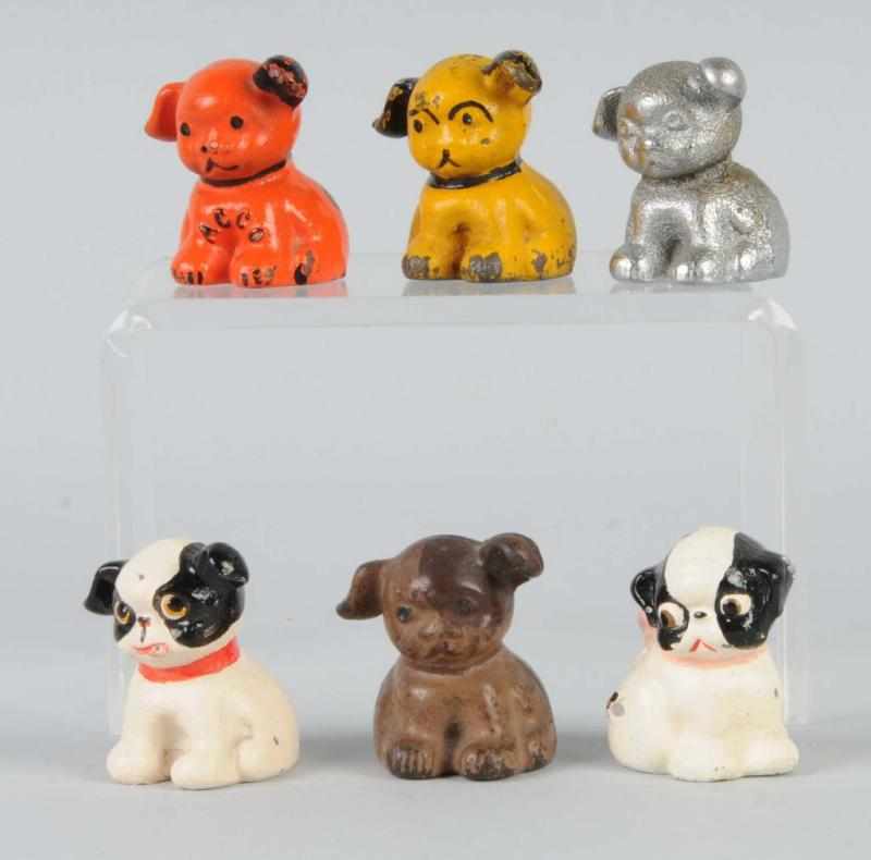 Appraisal: Lot of Cast Iron Dog Paperweights Description Assorted Puppo and