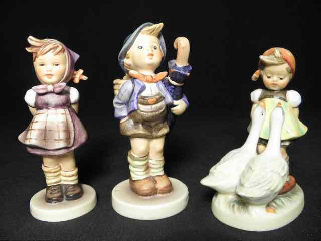 Appraisal: Lot of three Hummel German porcelain figurines Includes ''Goose Girl''