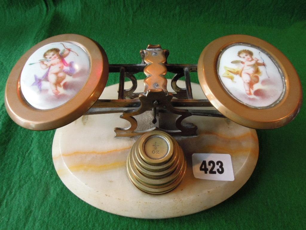 Appraisal: A set of Victorian postal scales in brass enclosing two