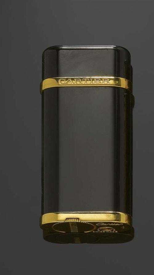 Appraisal: LIGHTER CARTIER Gas lighter with black lacquered sides base and