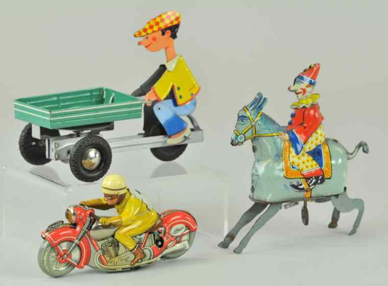 Appraisal: GROUPING OF GERMAN TIN TOYS Lot includes Schuco Moto-Drill Motorcycle