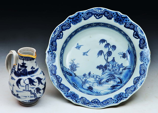 Appraisal: Chinese export cream jugNanking blue and white landscape decoration cm