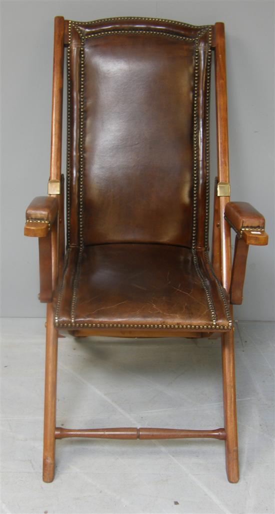 Appraisal: Late Victorian mahogany and leather upholstered folding campaign chair with