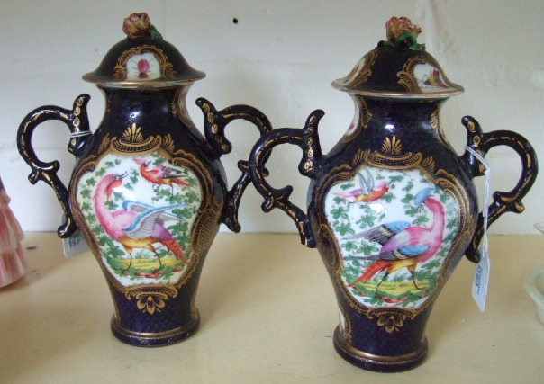 Appraisal: A pair of Sampson lidded vases in the style of