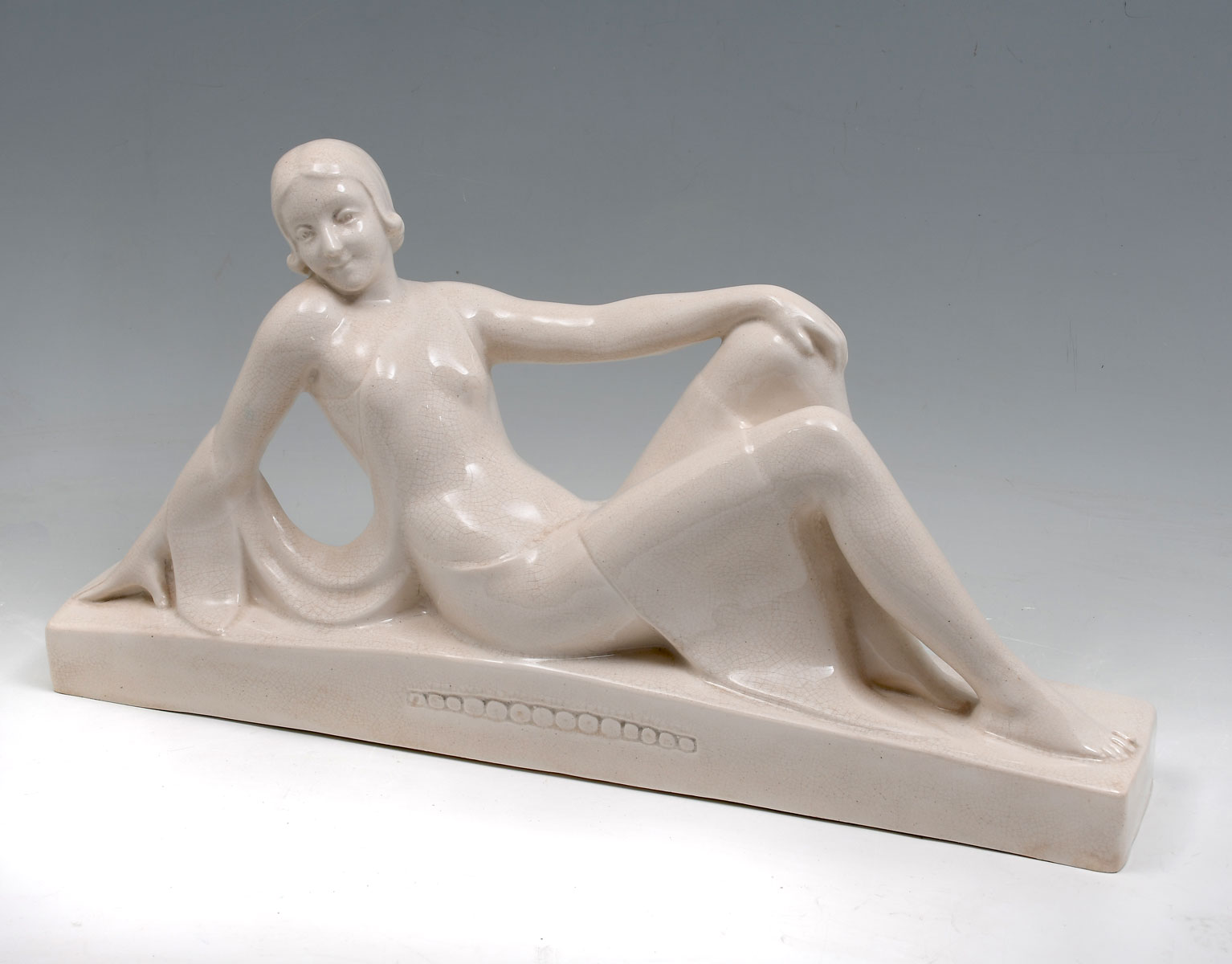 Appraisal: FRENCH PORCELAIN ART DECO RECLINING FEMALE Impressed France at underside