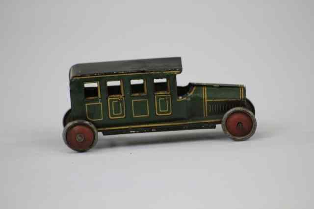 Appraisal: TOWN CAR PENNY TOY Fischer green with yellow trim example