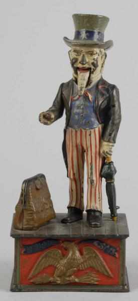 Appraisal: Cast Iron Uncle Sam Mechanical Bank Description Working Manufactured by