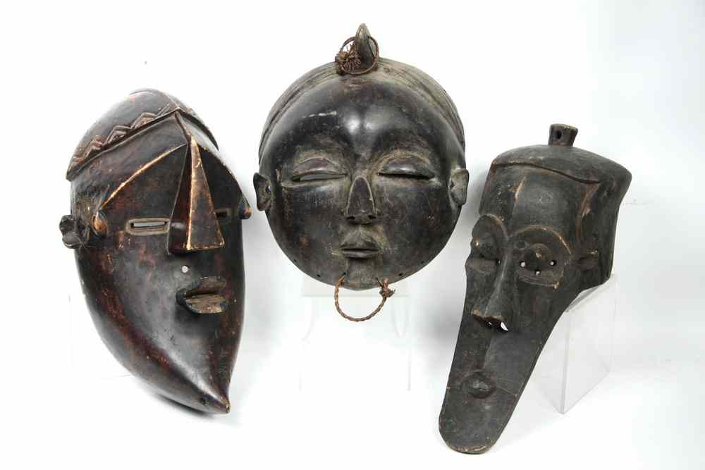 Appraisal: AFRICAN DISPLAY MASKS - Dan People all in unpainted stained