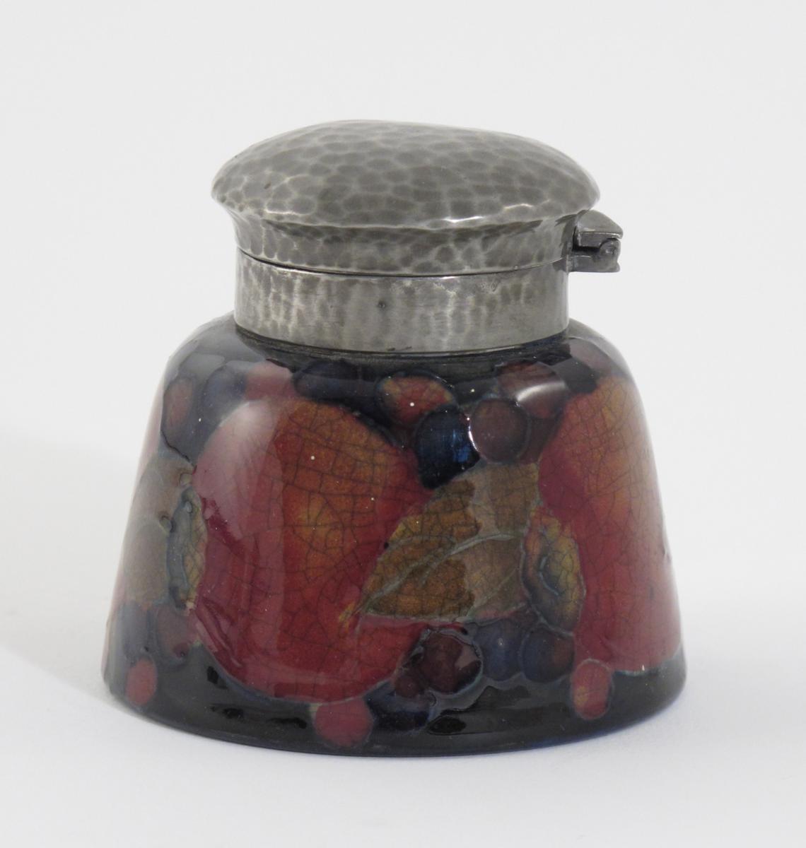 Appraisal: Pomegranate a Moorcroft Pottery inkwell with pewter mounts